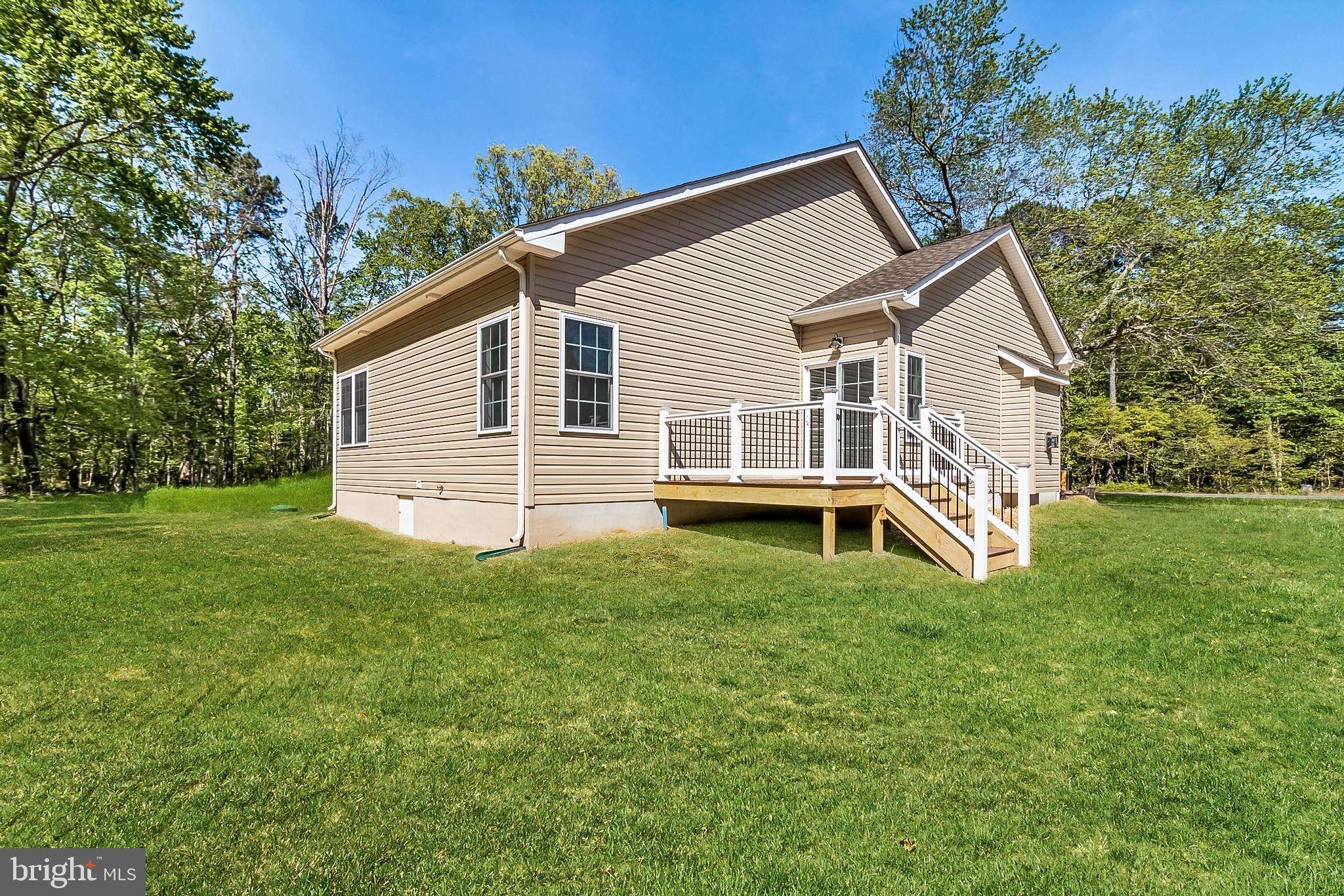 21183 Abell Road Avenue, MD 20609 - Photo 3 of 36 a view of a house with a backyard