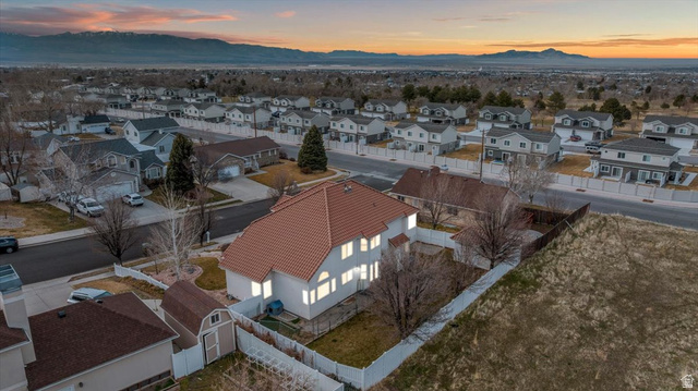 19 South 820 East Tooele, UT 84074 - Photo 44 of 46 Aerial view of residential area with mountains and lake