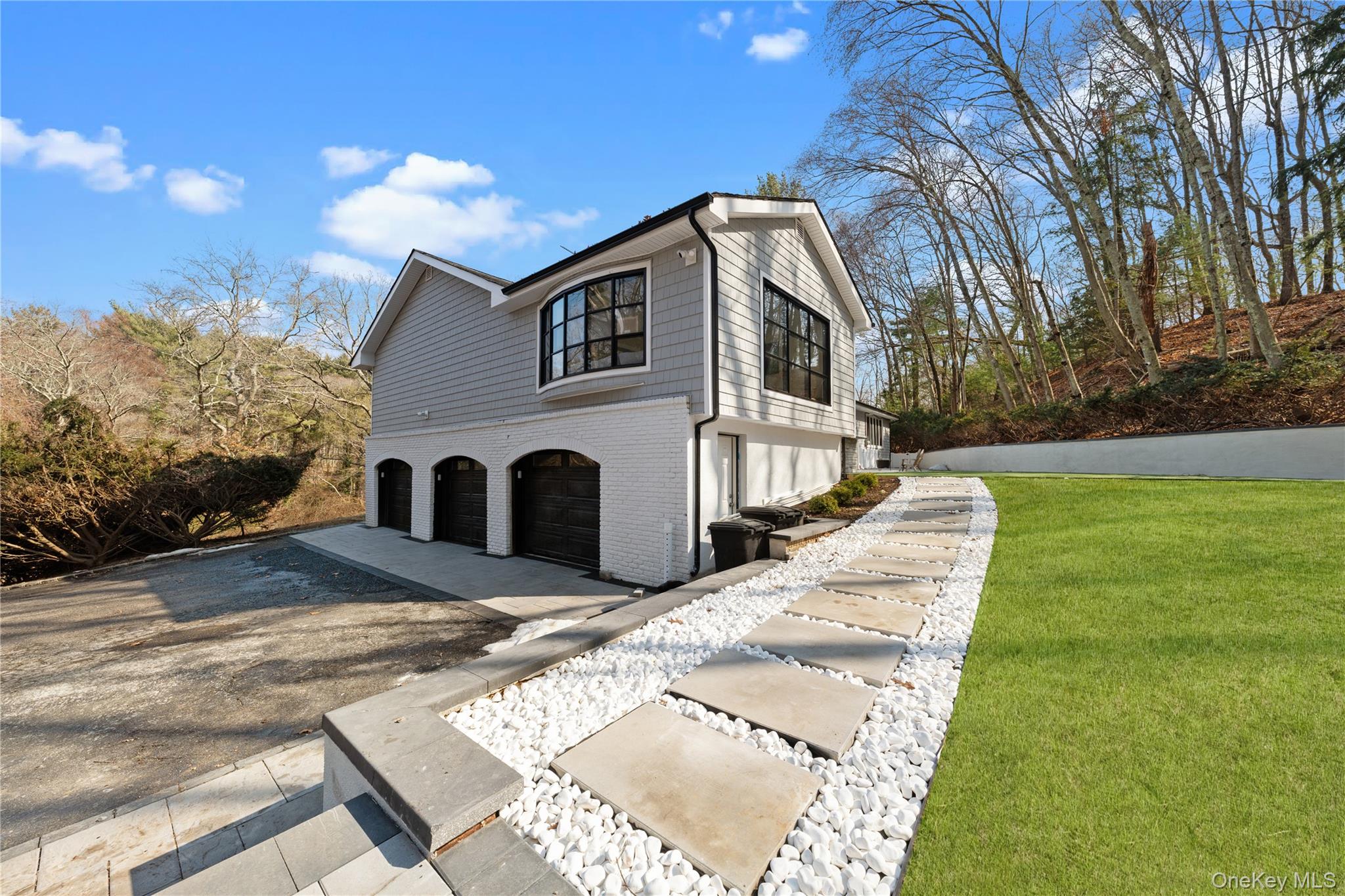 111 Mill River Road Oyster Bay, NY 11771 - Photo 1 of 48 a view of a house with a yard