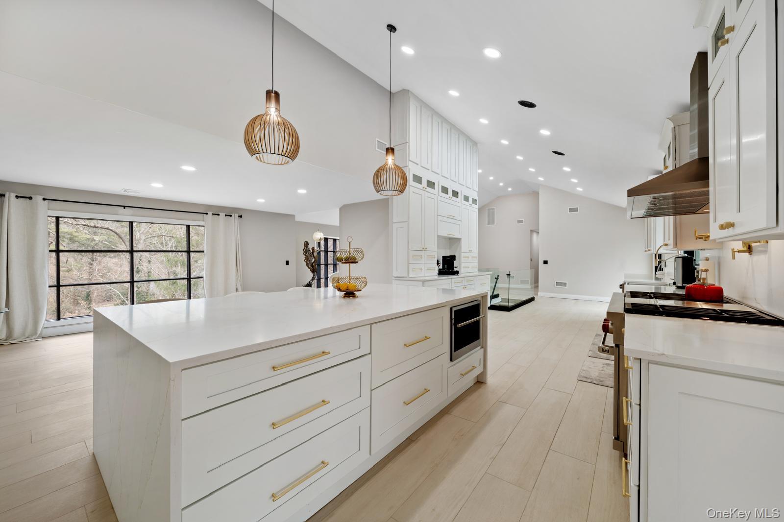 111 Mill River Road Oyster Bay, NY 11771 - Photo 13 of 48 a kitchen with counter top space and a sink