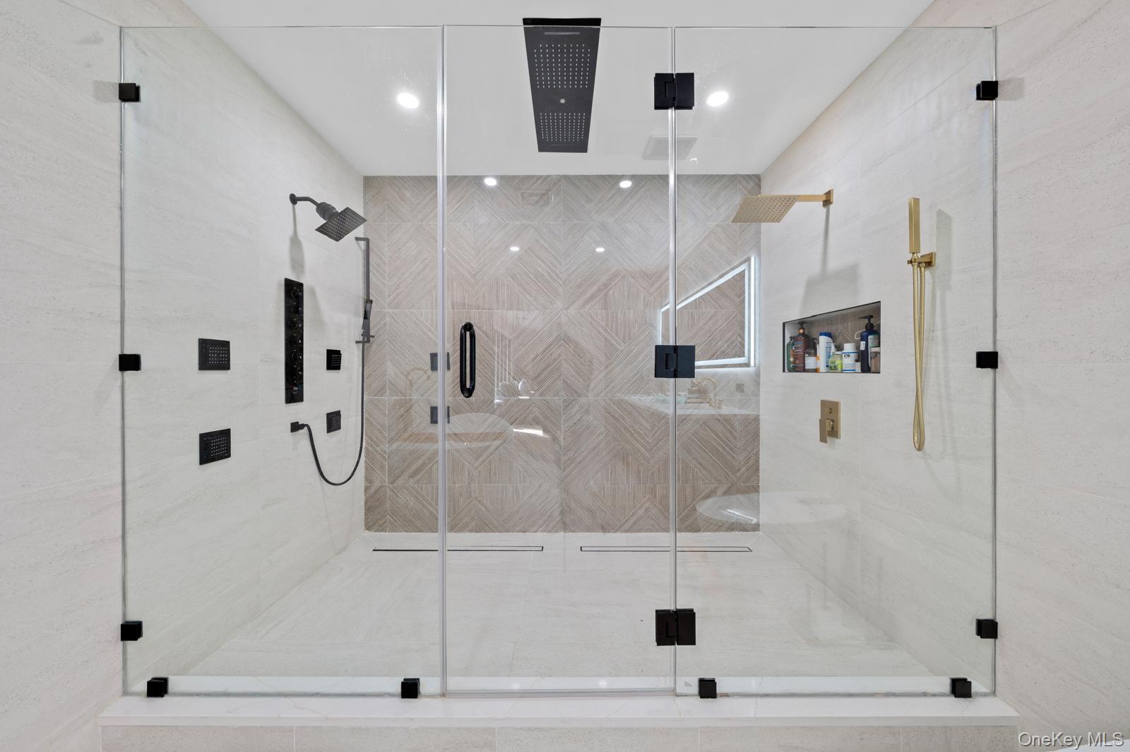 111 Mill River Road Oyster Bay, NY 11771 - Photo 24 of 48 a bathroom with a bathtub and a shower