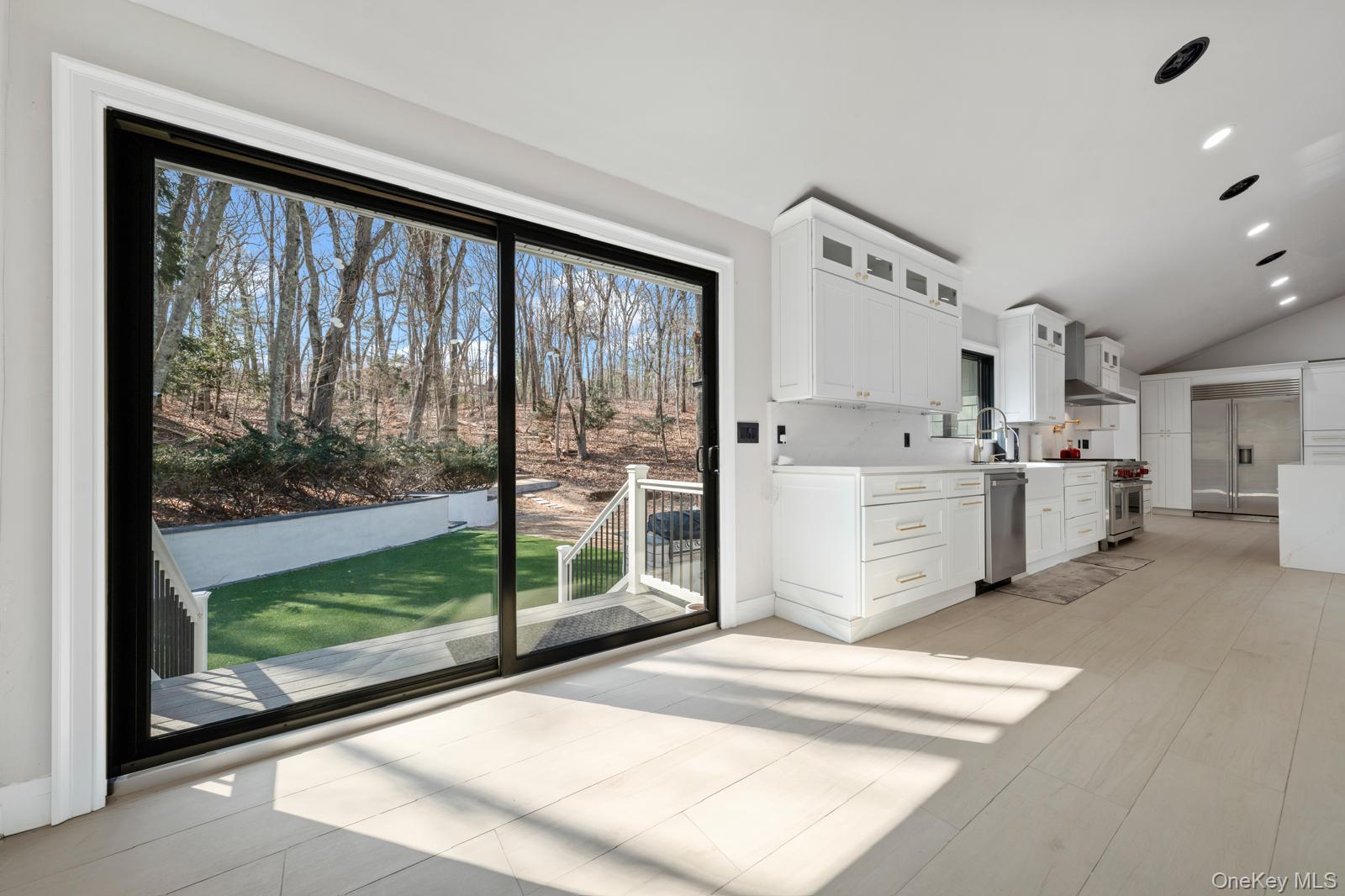 111 Mill River Road Oyster Bay, NY 11771 - Photo 36 of 48 a view of kitchen with furniture and large window