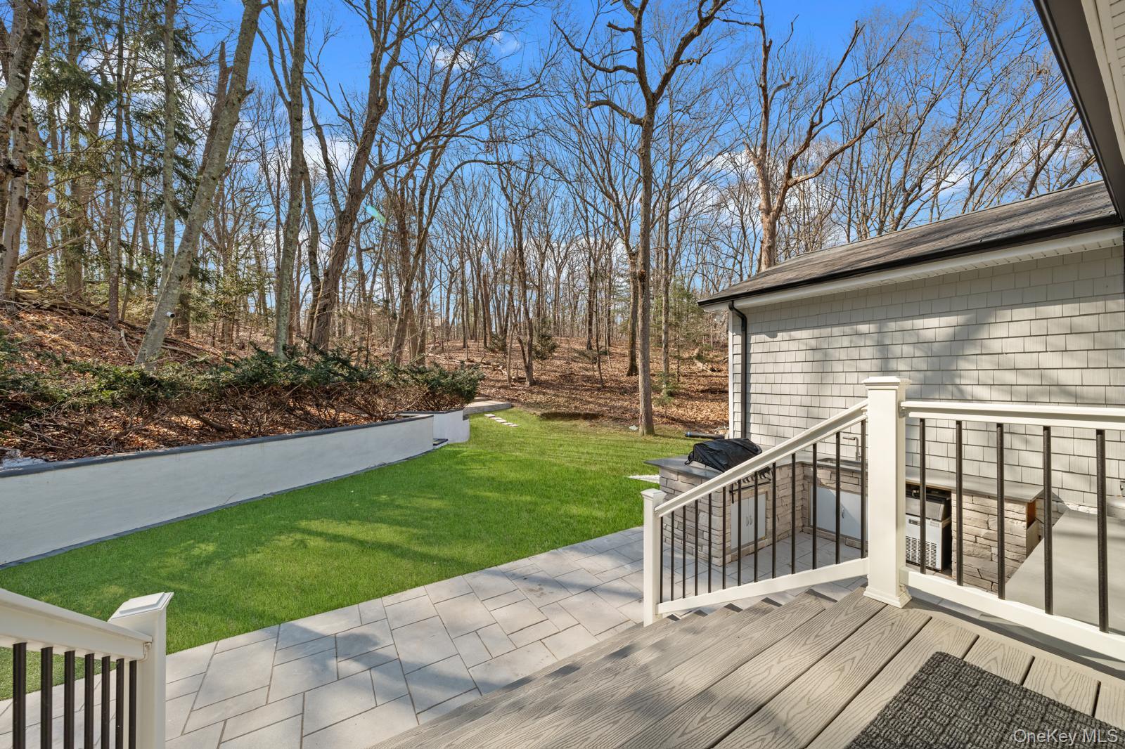 111 Mill River Road Oyster Bay, NY 11771 - Photo 37 of 48 a view of a deck with a backyard