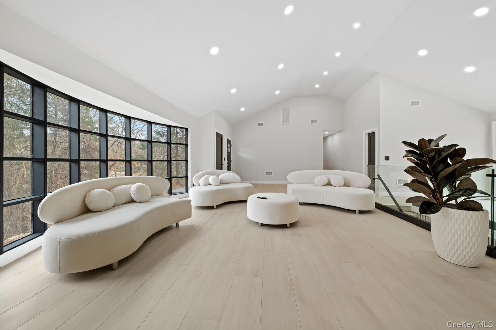 111 Mill River Road Oyster Bay, NY 11771 - Photo 6 of 48 a living room with furniture and a couch