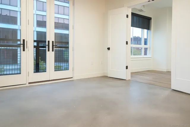 an empty room with windows