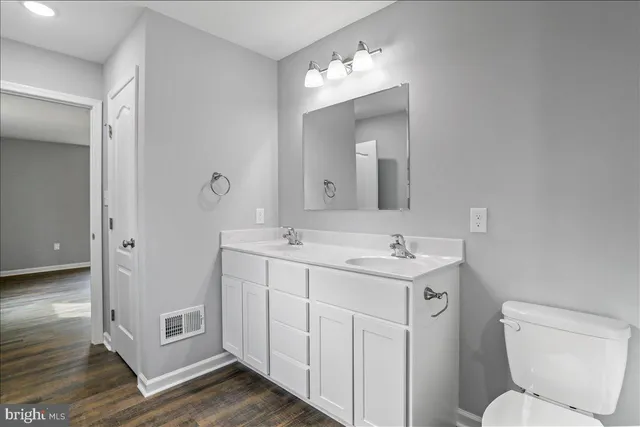 a view of city and green space