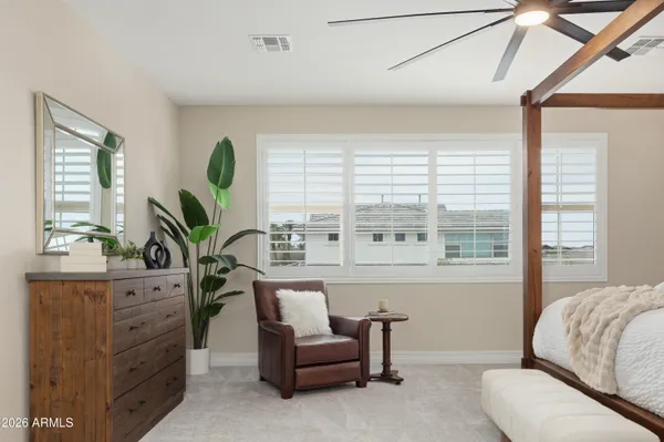 a living room with furniture and windows