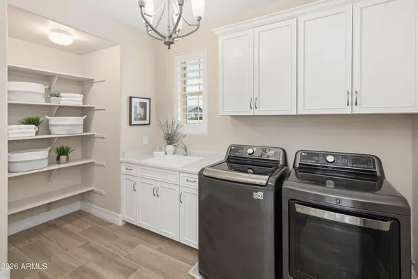 a kitchen with a stove and cabinets