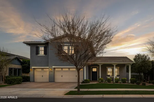 front view of the house with a yard