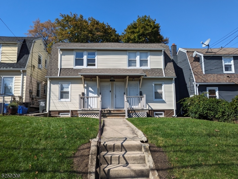 116 Maple Avenue, Unit 1 Montclair, NJ 07042 - Photo 1 of 7 a front view of a house with a garden and porch