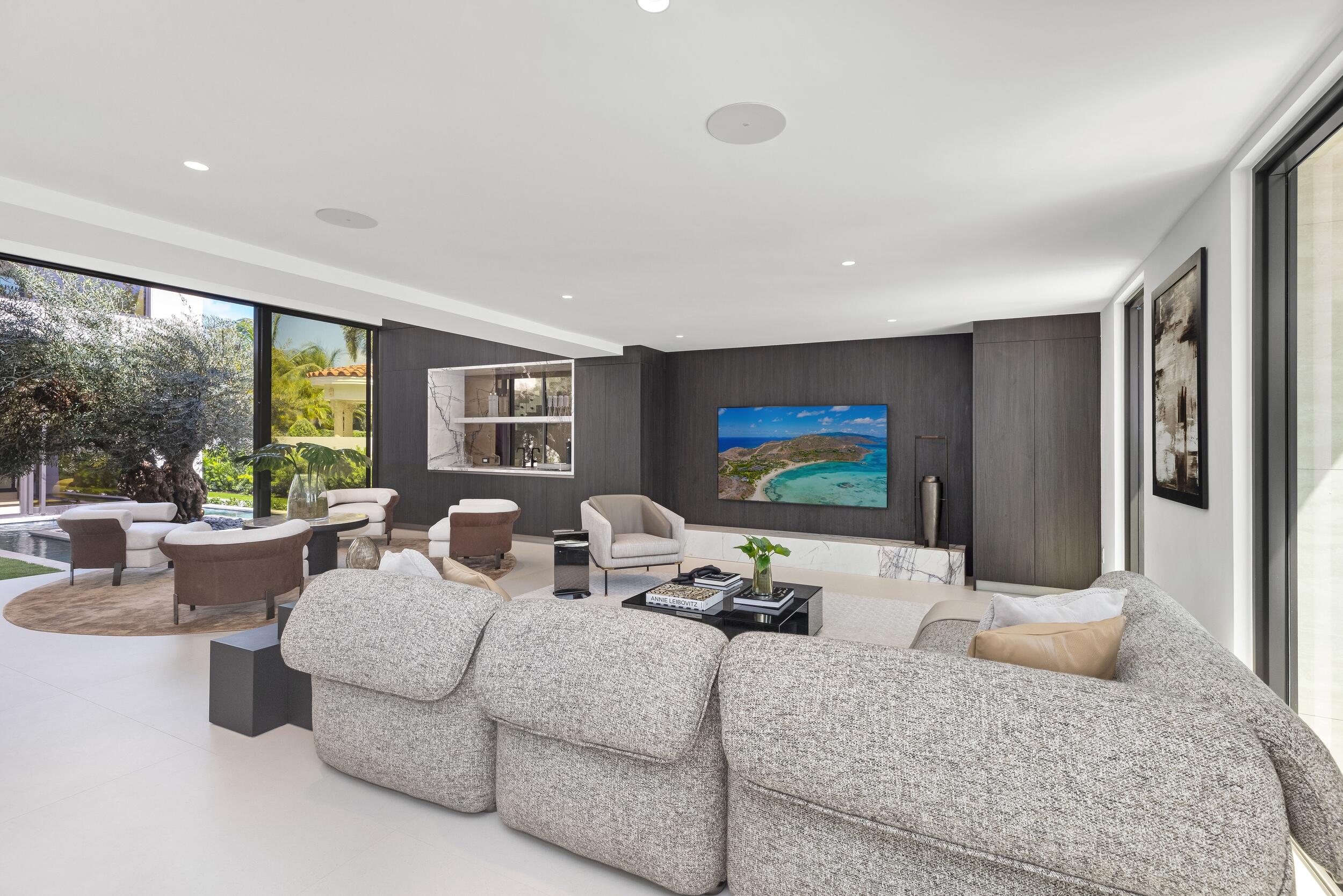 1351 Cocoanut Road Boca Raton, FL 33432 - Photo 22 of 101 a living room with furniture and a flat screen tv