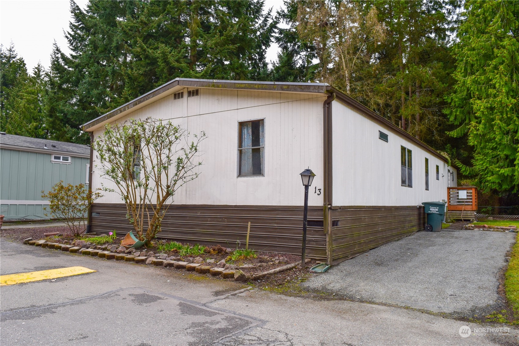 a side view of a house with garage