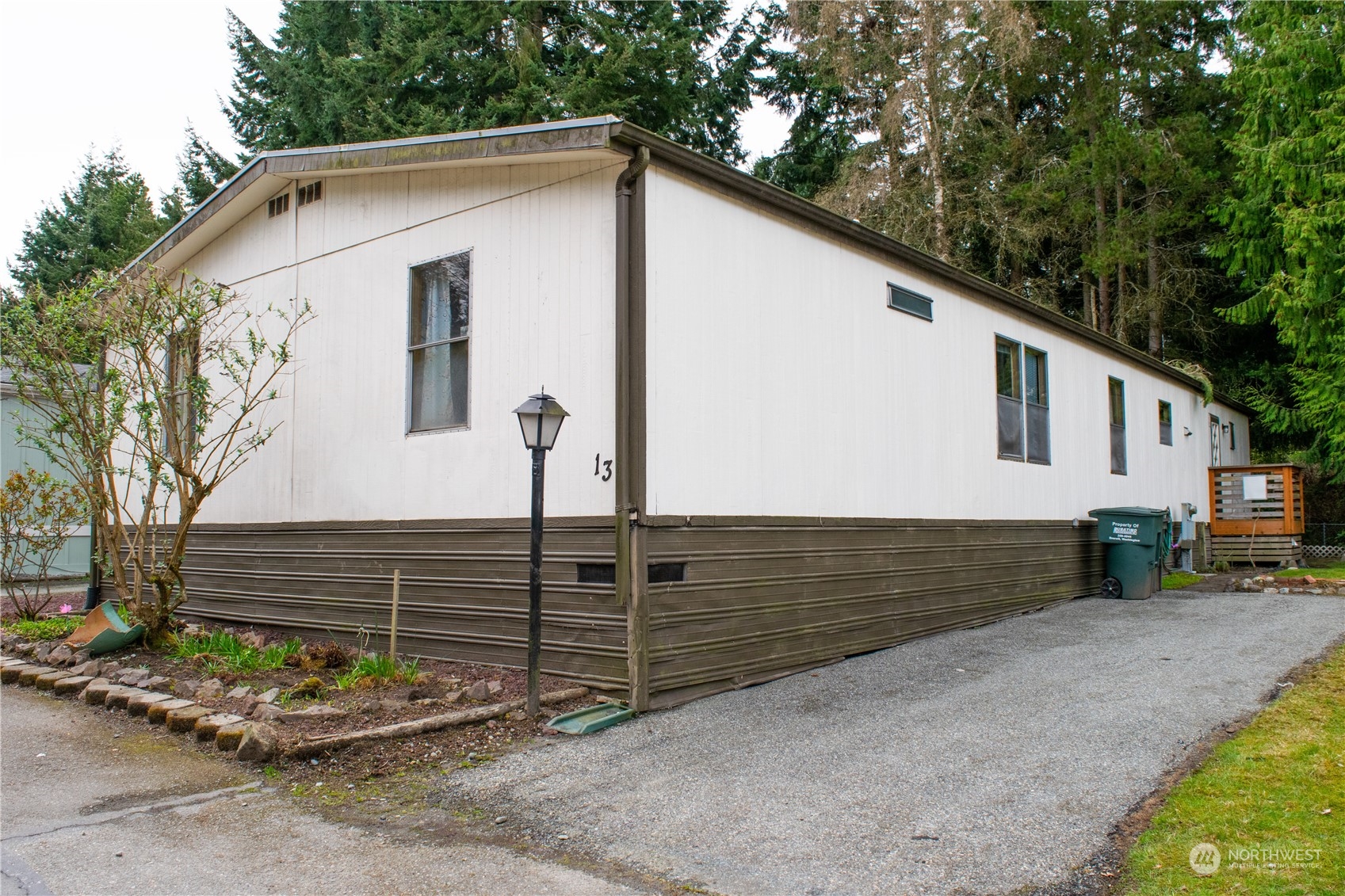 7701 Hardeson Road, Unit 13 Everett, WA 98203 - Photo 3 of 22 a view of a house with a yard
