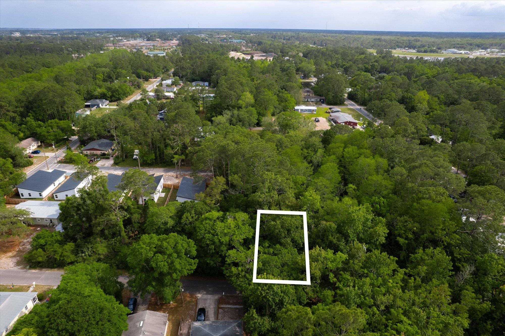 0 West 8th Street St. Augustine, FL 32084 - Photo 10 of 31 an aerial view of a house with yard