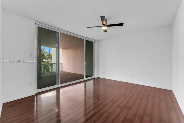 a bathroom with a tub a sink and mirror