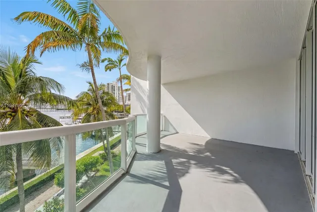 a view of a swimming pool with a lounge chairs