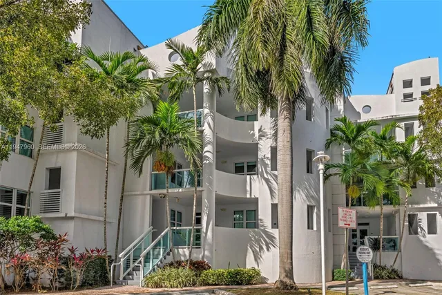 a view of walk in closet with a fireplace