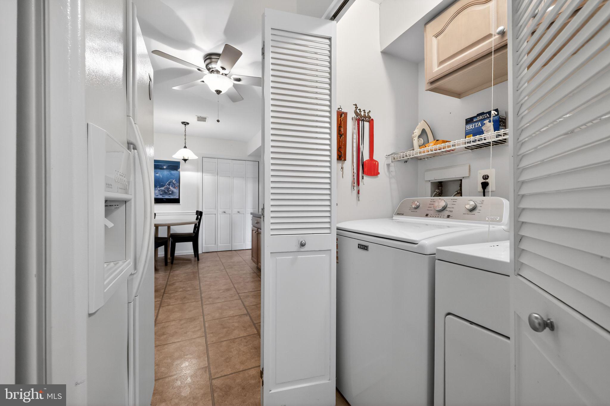 213 Haddonfield Cmns, Unit 213 Haddonfield, NJ 08033 - Photo 32 of 35 Bright and functional laundry space.