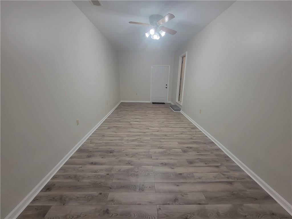 1326 Lori Court Conley, GA 30288 - Photo 14 of 15 wooden floor in an empty room
