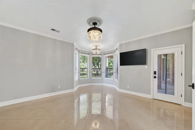 a bathroom with a granite countertop sink a toilet a mirror and bathtub