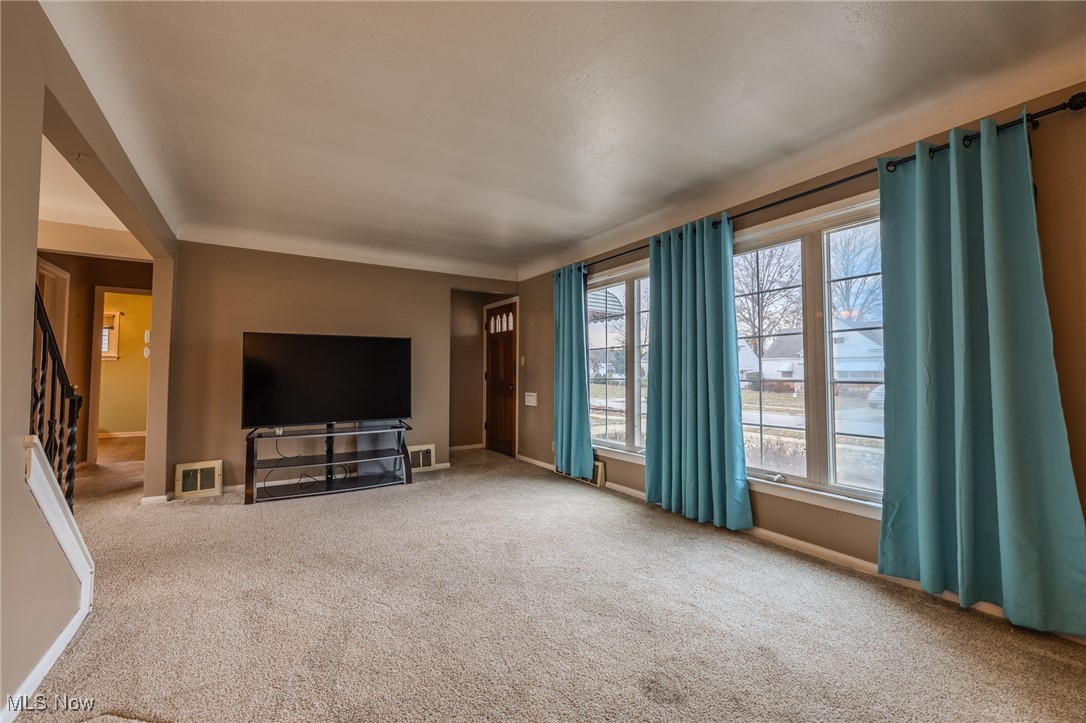 765 Pendley Road Willowick, OH 44095 - Photo 44 of 50 Unfurnished living room with carpet flooring