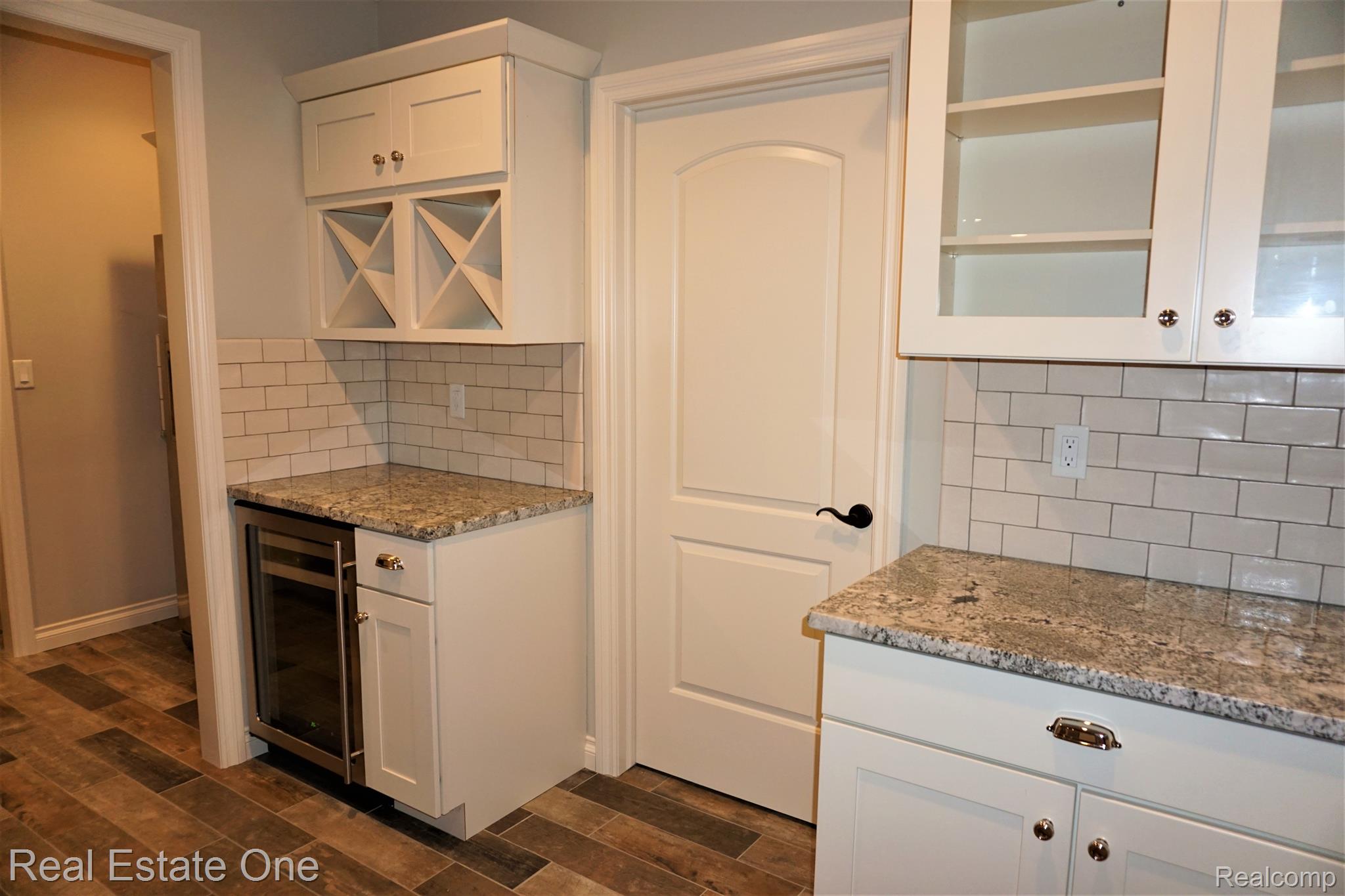 2949 Ambleside Court Rochester, MI 48306 - Photo 53 of 67 Basement Kitchen with Door to the Pantry/Storage