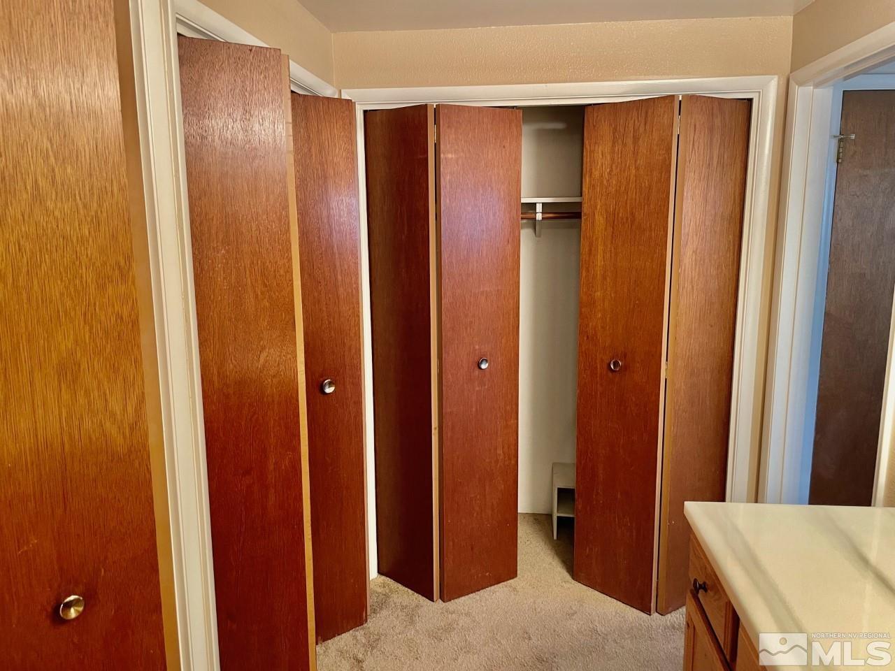 3280 Idlewild Drive Reno, NV 89509 - Photo 16 of 22 a view of a bathroom with a mirror