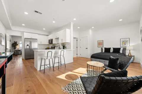 a living room with furniture and a window