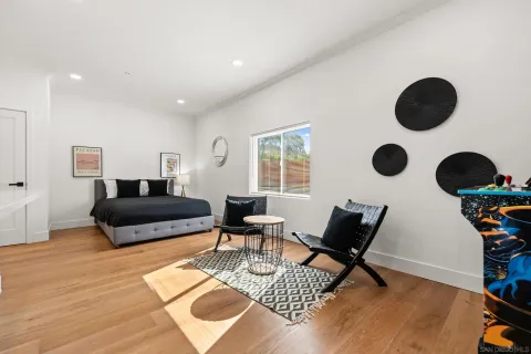 a bedroom with a bed and furniture