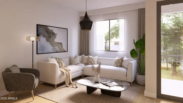 a living room with furniture and a large window