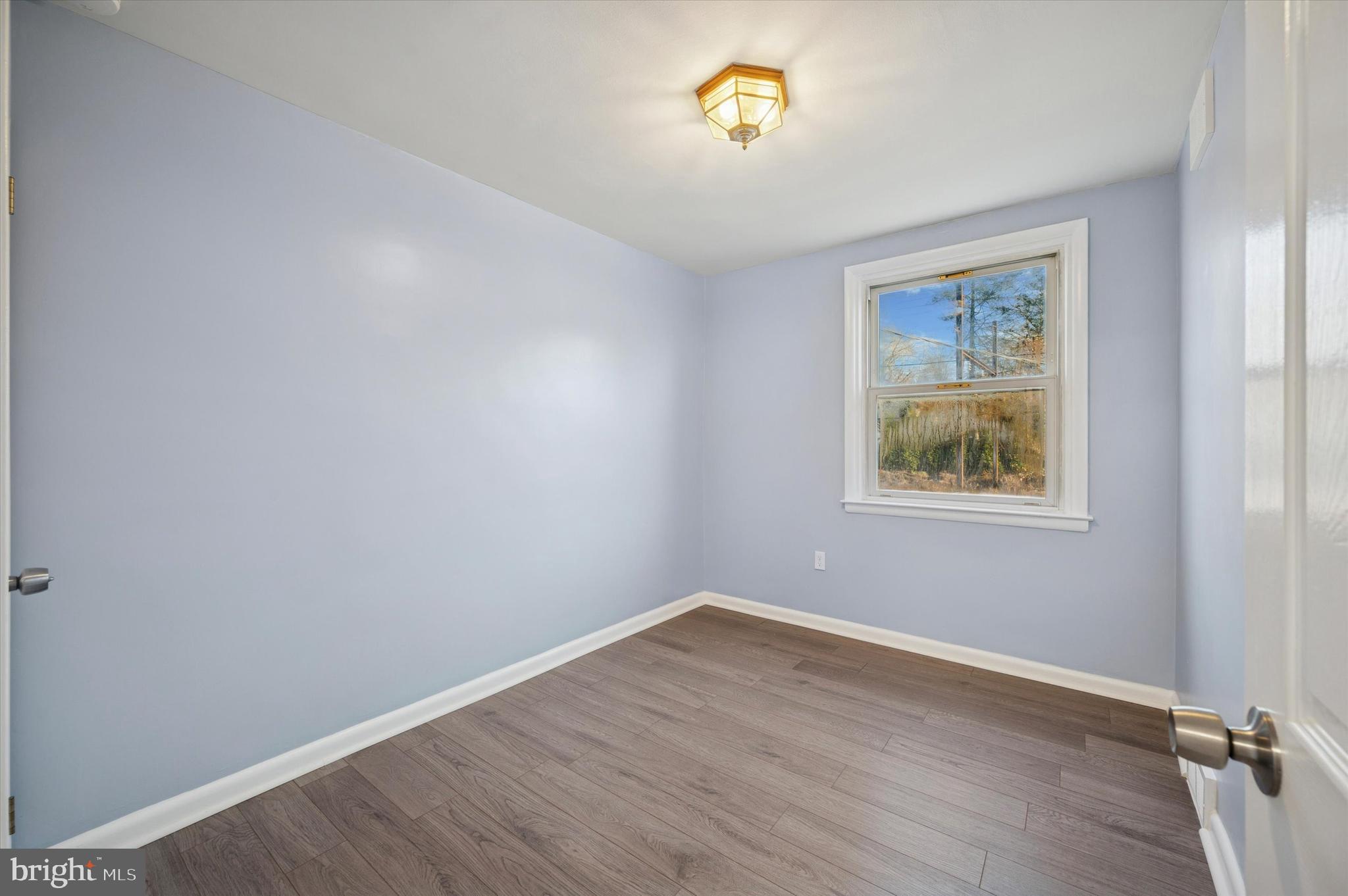 555 Wanamaker Road Jenkintown, PA 19046 - Photo 14 of 26 an empty room with a window