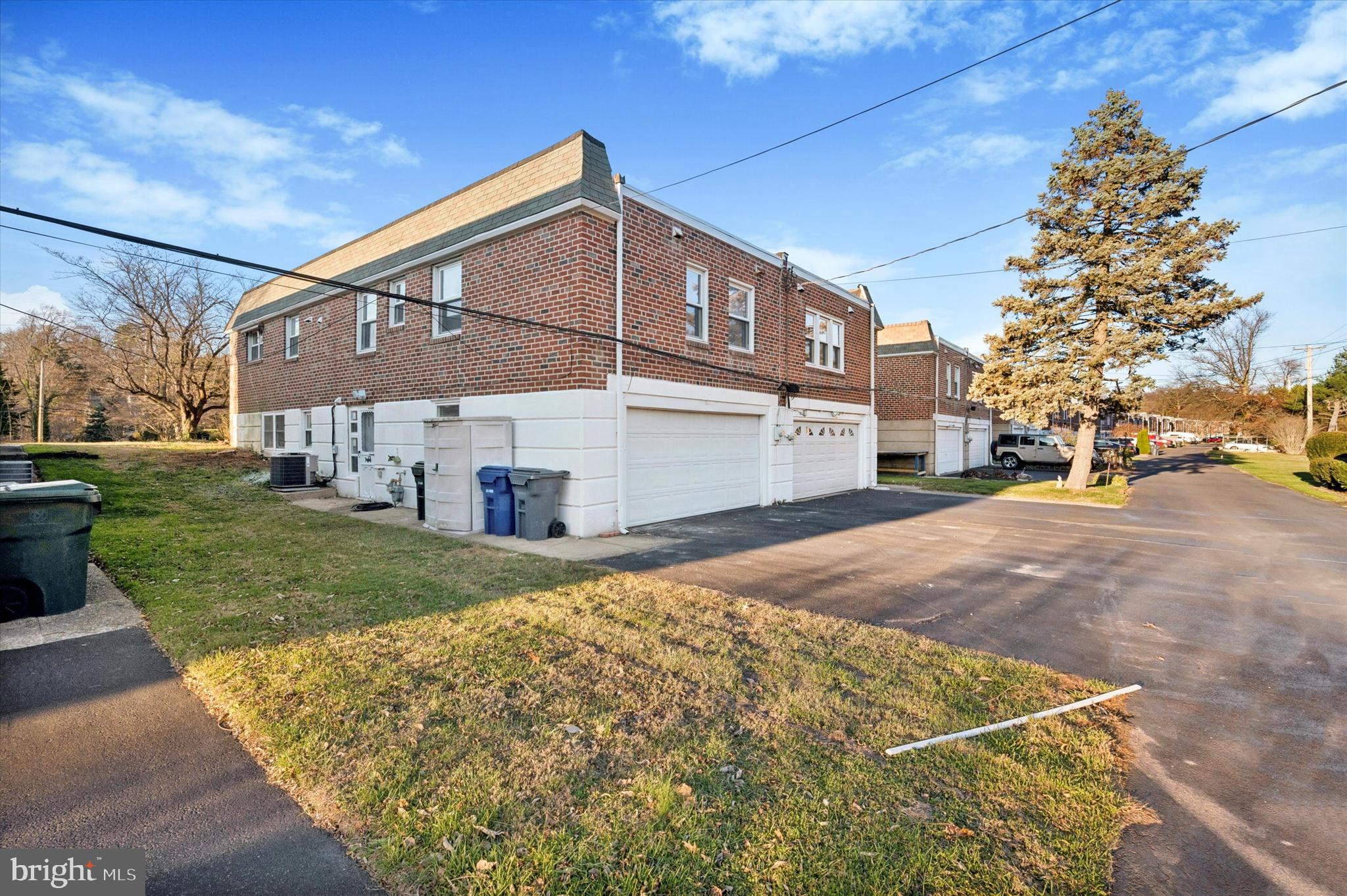 555 Wanamaker Road Jenkintown, PA 19046 - Photo 22 of 26 a front view of a house with a yard