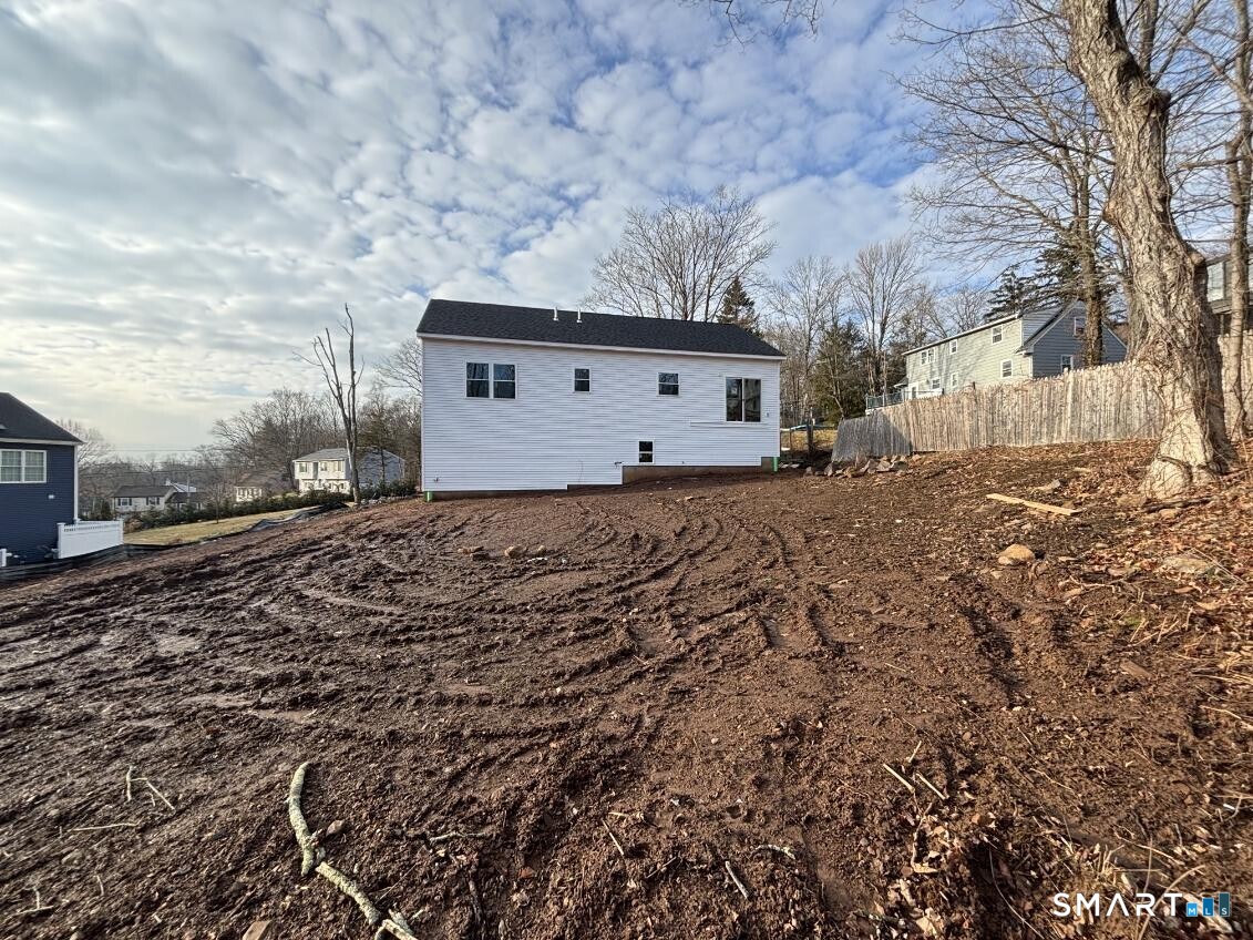 180 Carey Avenue Meriden, CT 06451 - Photo 5 of 7 a view of a house with a yard
