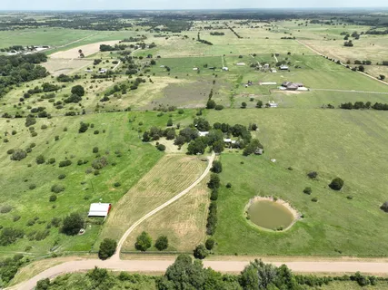 a view of a yard with an ocean