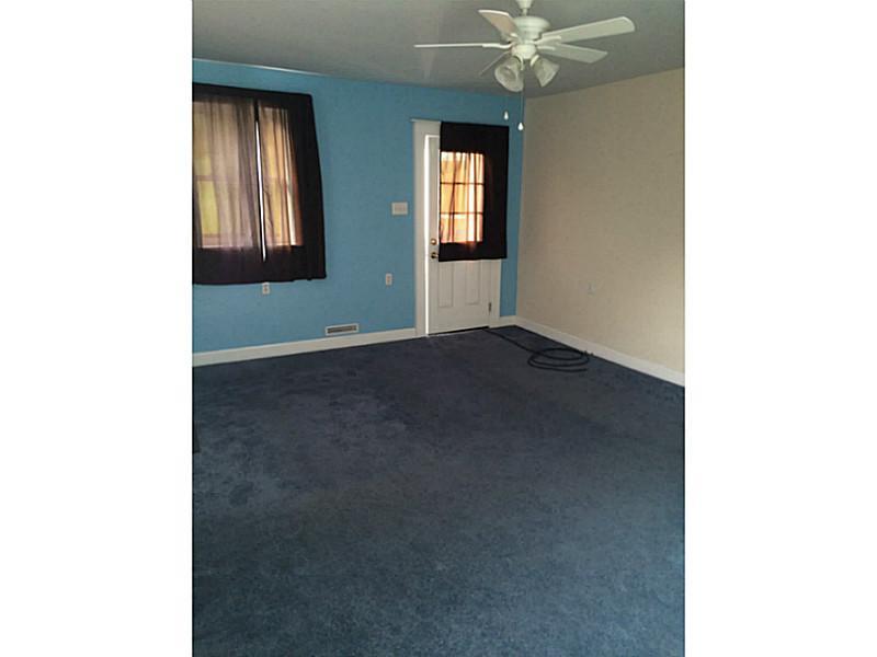 1062 Mount Morris Road Waynesburg, PA 15370 - Photo 7 of 13 Living Room. Could be converted back into a bedroom.