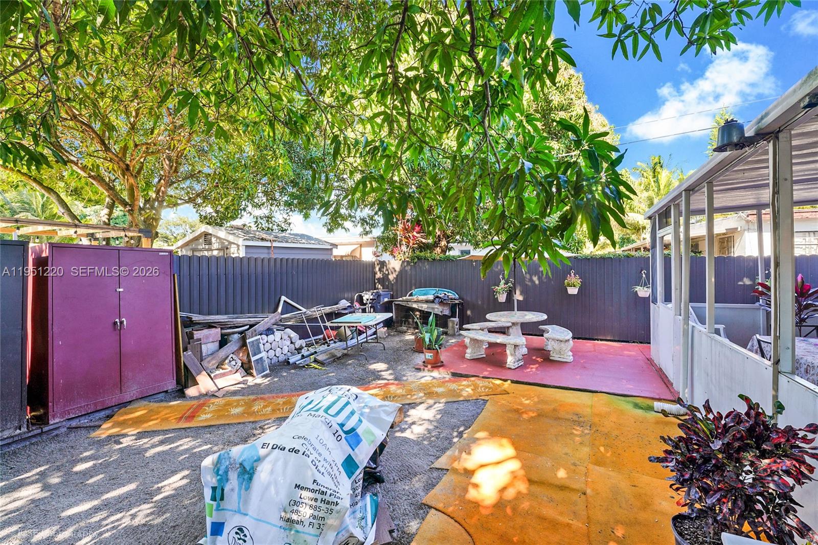 860 Southeast 7th Avenue Hialeah, FL 33010 - Photo 15 of 16 a view of backyard with swimming pool and furniture