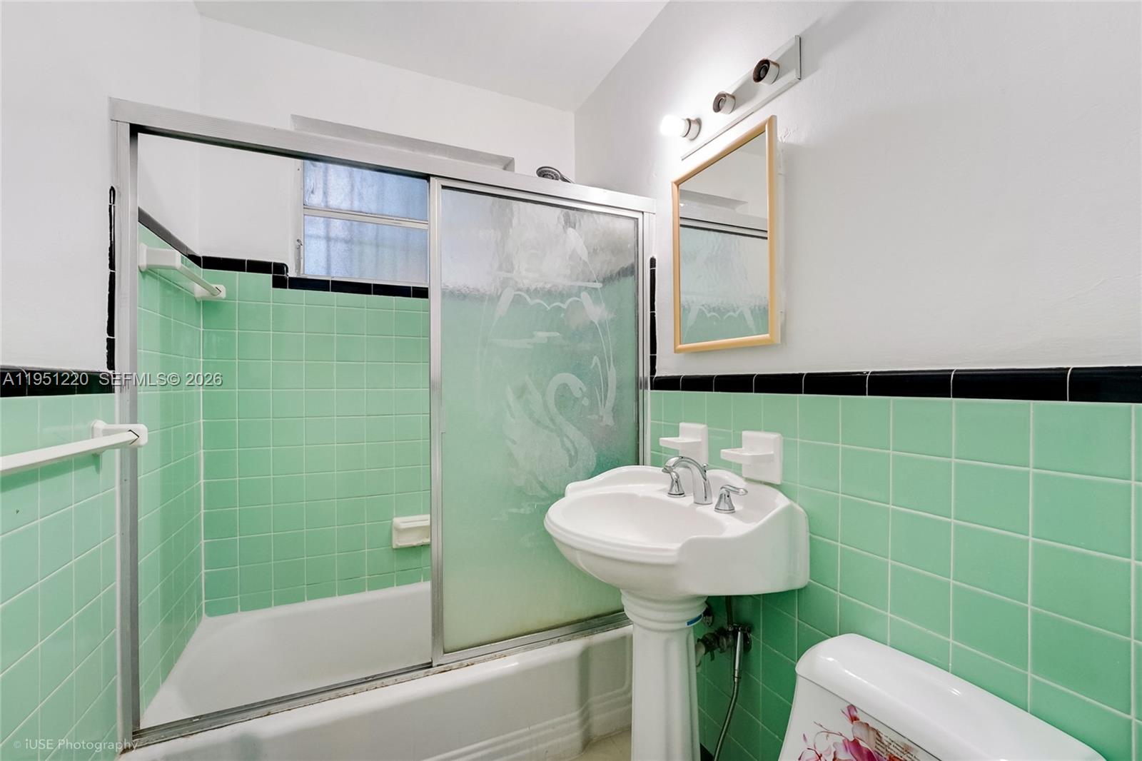 860 Southeast 7th Avenue Hialeah, FL 33010 - Photo 9 of 16 a bathroom with a sink toilet and shower