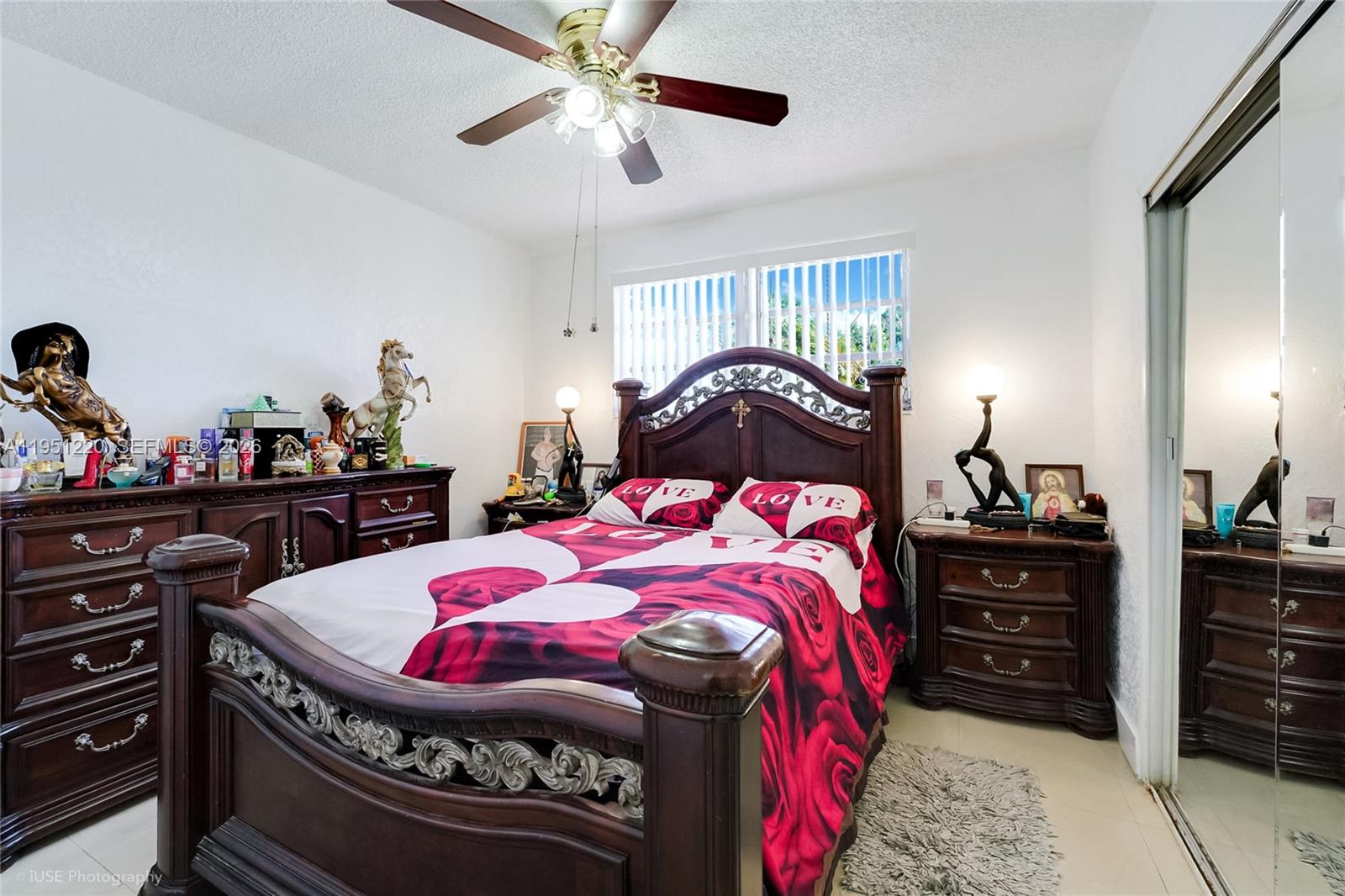 860 Southeast 7th Avenue Hialeah, FL 33010 - Photo 10 of 16 a bedroom with a bed and a dresser