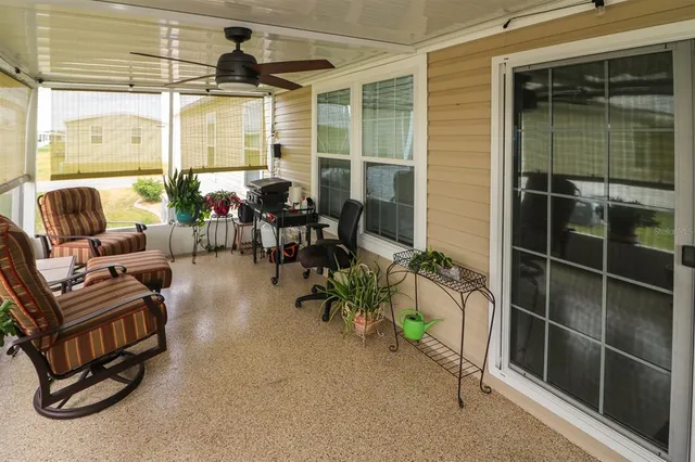 a view of a livingroom with furniture and front door