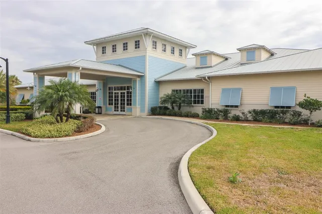 front view of a house with a swimming pool