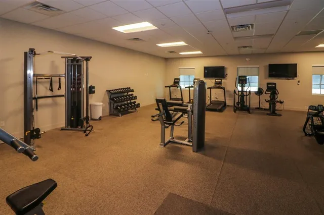 a view of a room with gym equipment