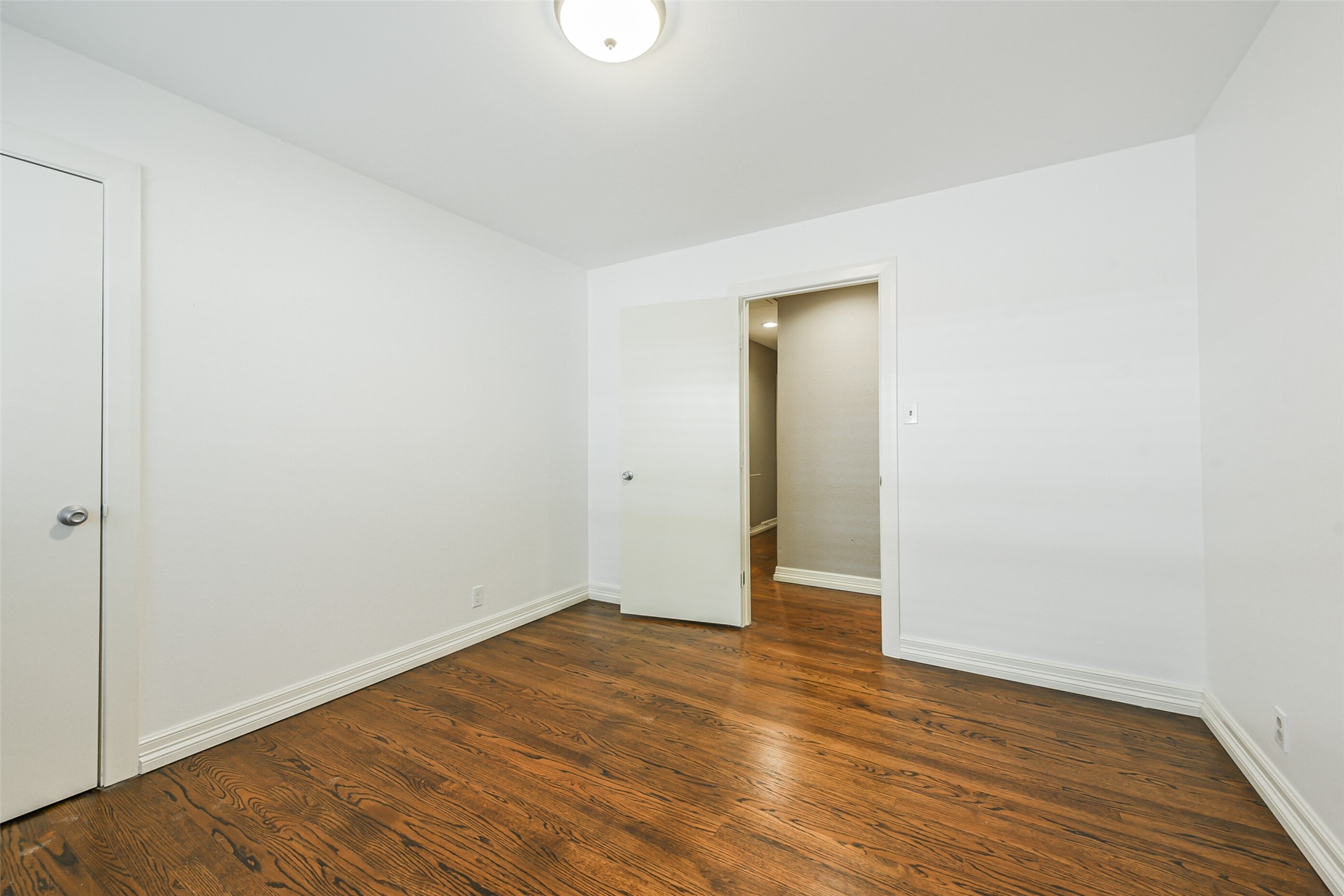 10251 Old Orchard Road La Porte, TX 77571 - Photo 12 of 15 a view of an empty room with wooden floor