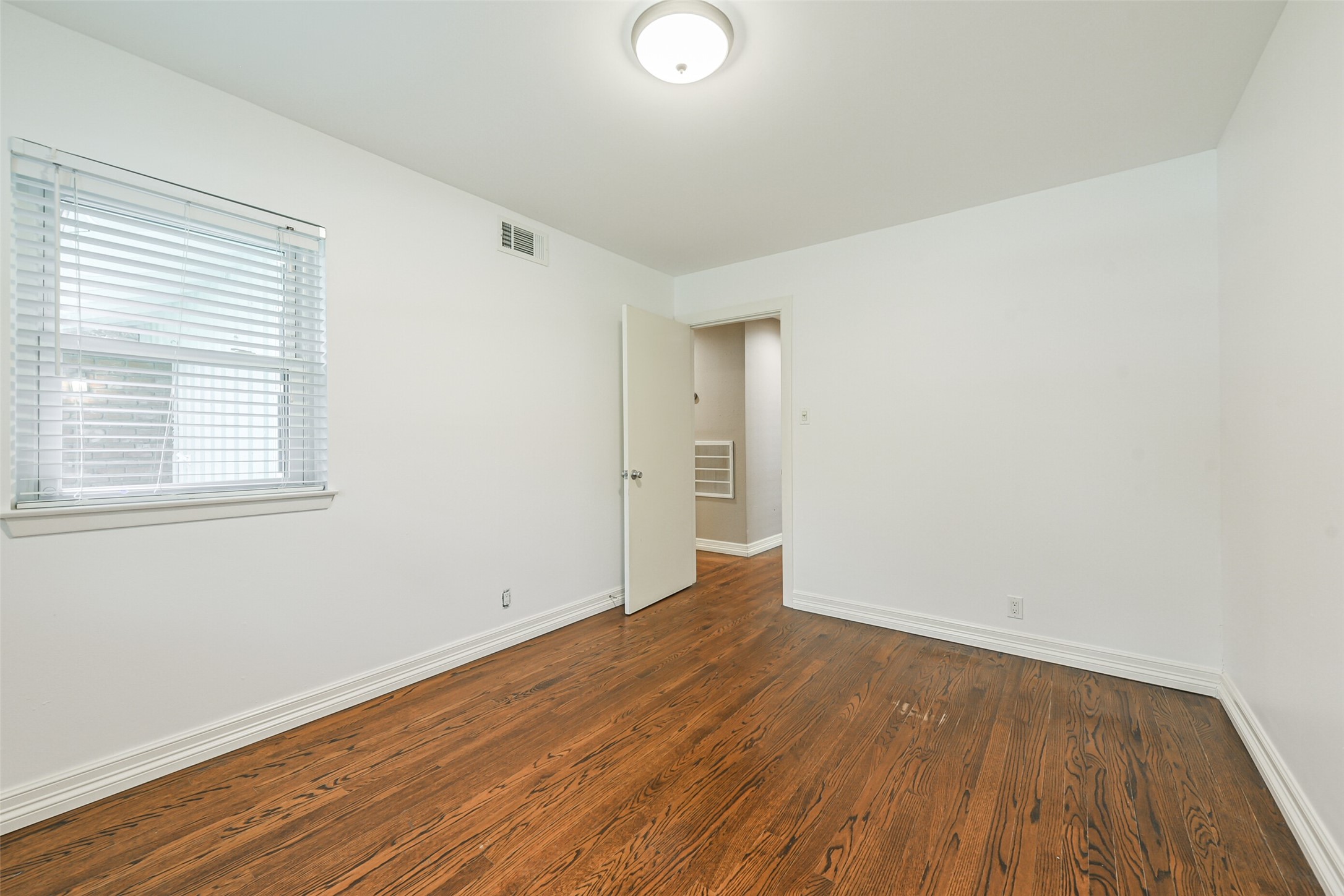 10251 Old Orchard Road La Porte, TX 77571 - Photo 14 of 15 wooden floor in an empty room
