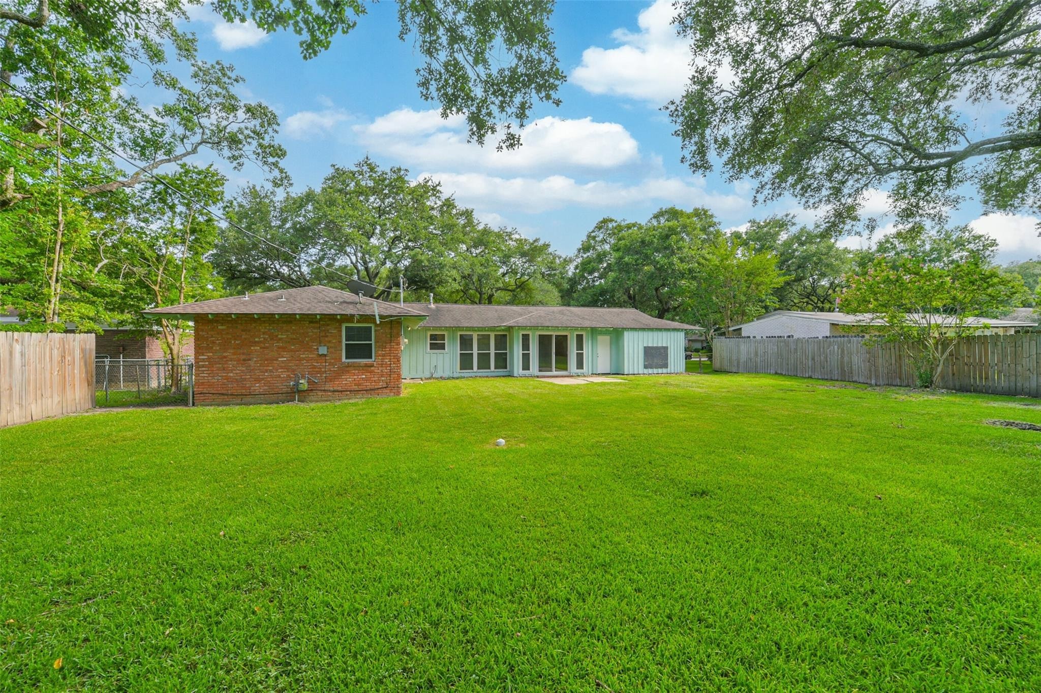 10251 Old Orchard Road La Porte, TX 77571 - Photo 15 of 15 a front view of house with yard and green space