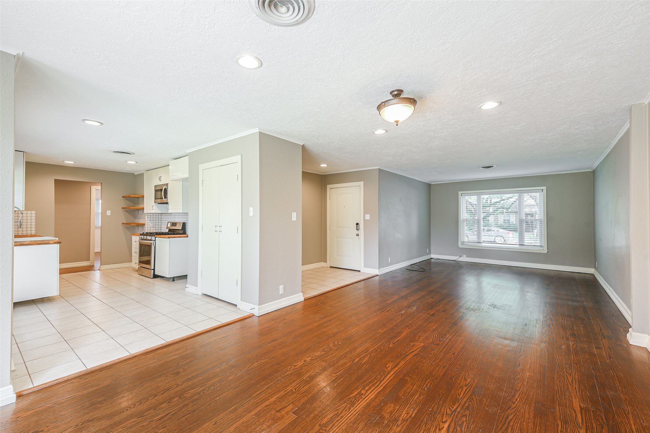 10251 Old Orchard Road La Porte, TX 77571 - Photo 5 of 15 a view of a kitchen with wooden floor and a kitchen space