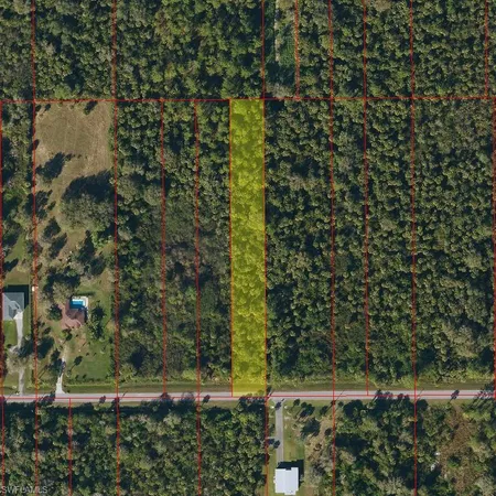 a view of outdoor space and a yard