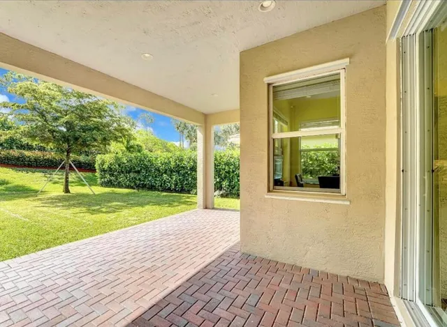 a view of a porch with a yard