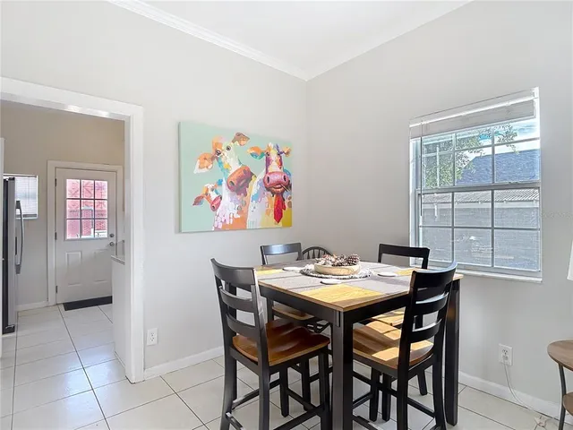 a view of a dining room with furniture