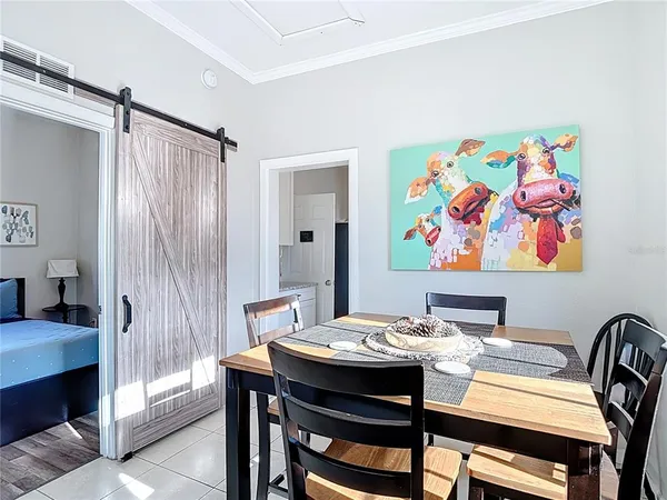 a living room with furniture and a table