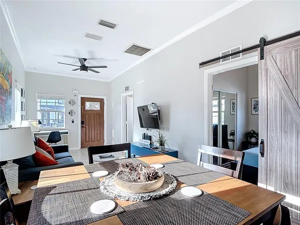 a view of a dining room with furniture